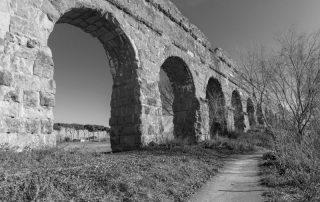 Road beside an ancient aqueduct