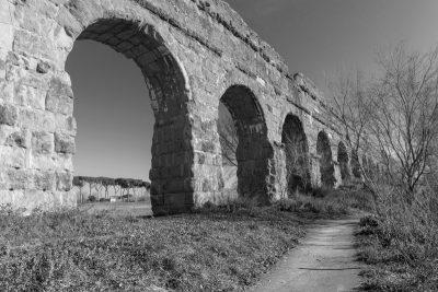 Road beside an ancient aqueduct